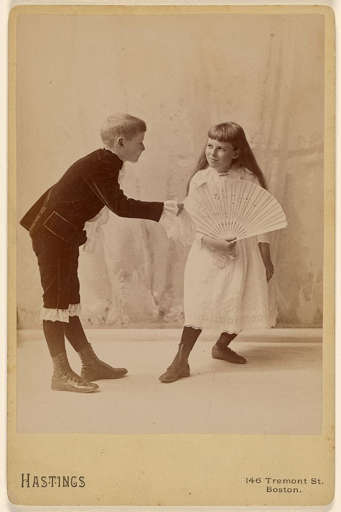 A young boy and girl dancing by George H Hastings