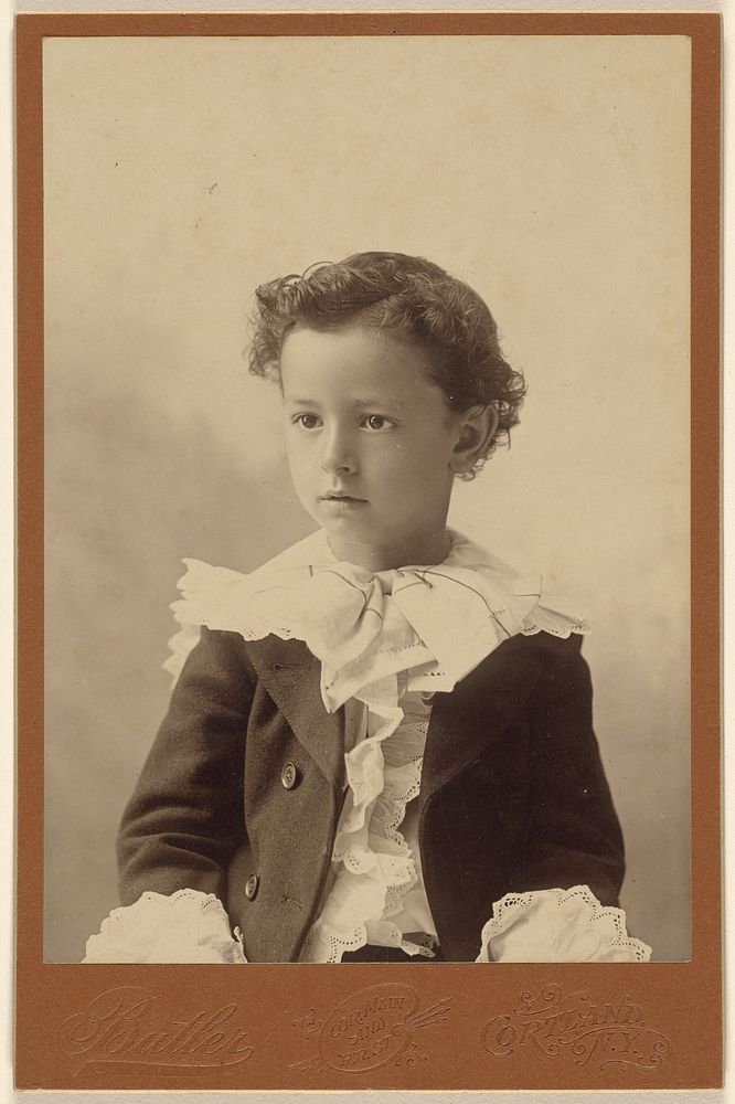 Unidentified little boy, seated by George Edwin Butler