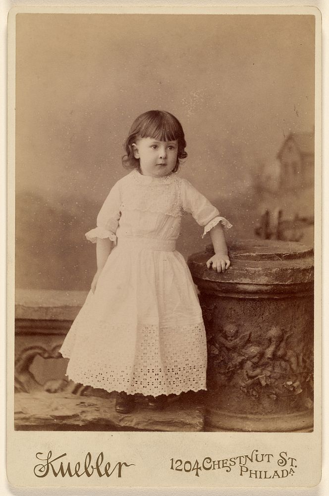 Unidentified little girl, standing by Kuebler
