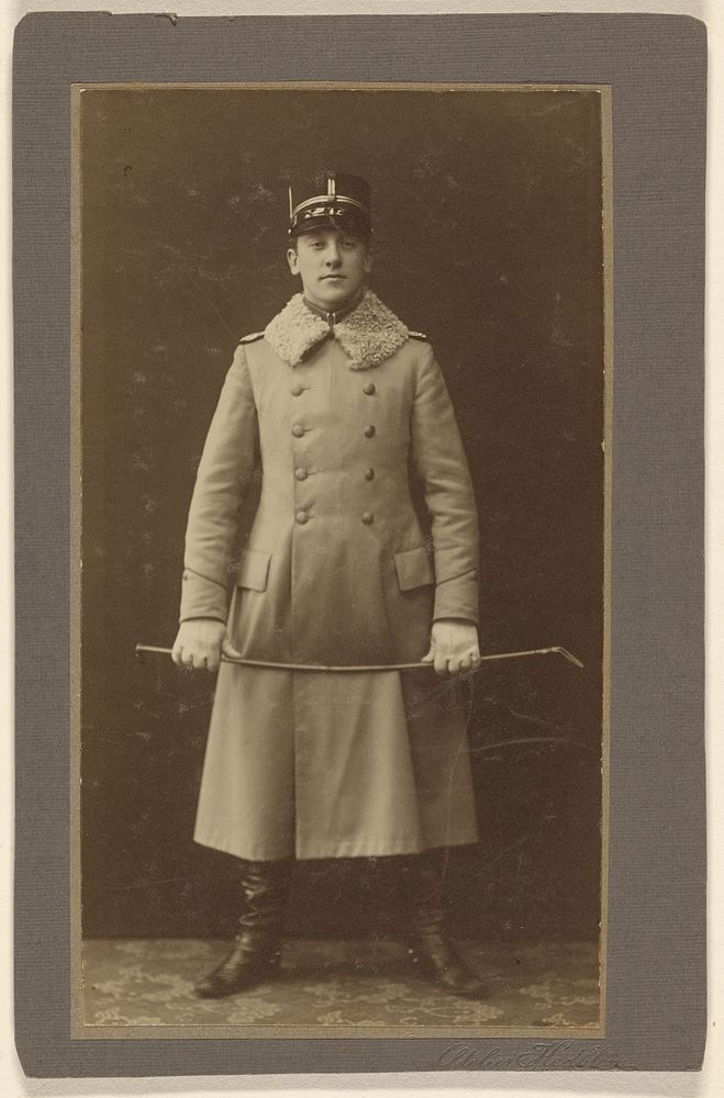 Unidentified soldier in long coat, holding a riding crop by Hedblom