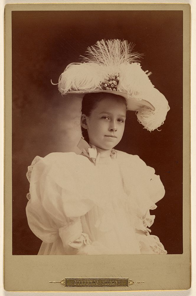 Unidentified little girl in fancy white hat and dress by Steffens