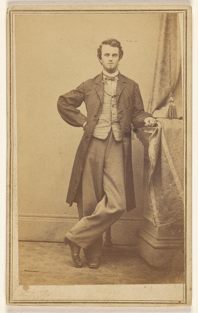 Unidentified young bearded man, standing by Robert M Boggs