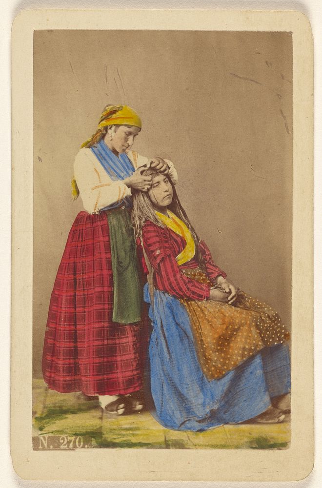 [Older woman doing the hair of a younger woman]. by Giorgio Conrad