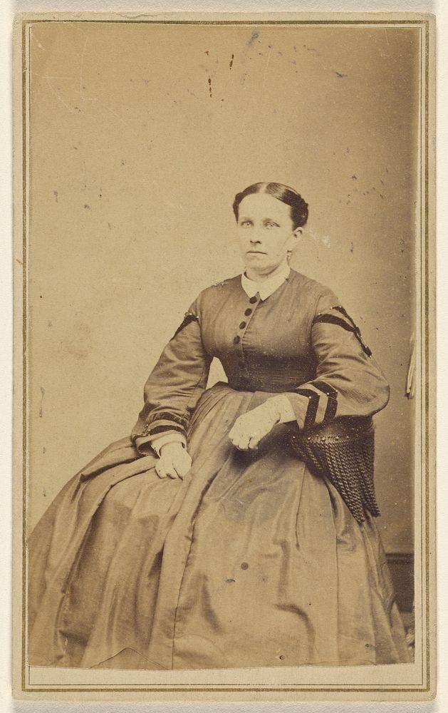 Unidentified woman seated by John P Percival