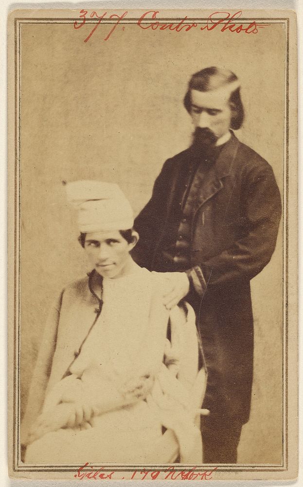 E. Giles [Doctor with Civil War victim] by William H Bell