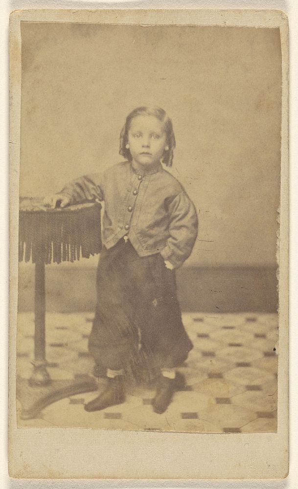 Unidentified little girl, standing by W J Miller