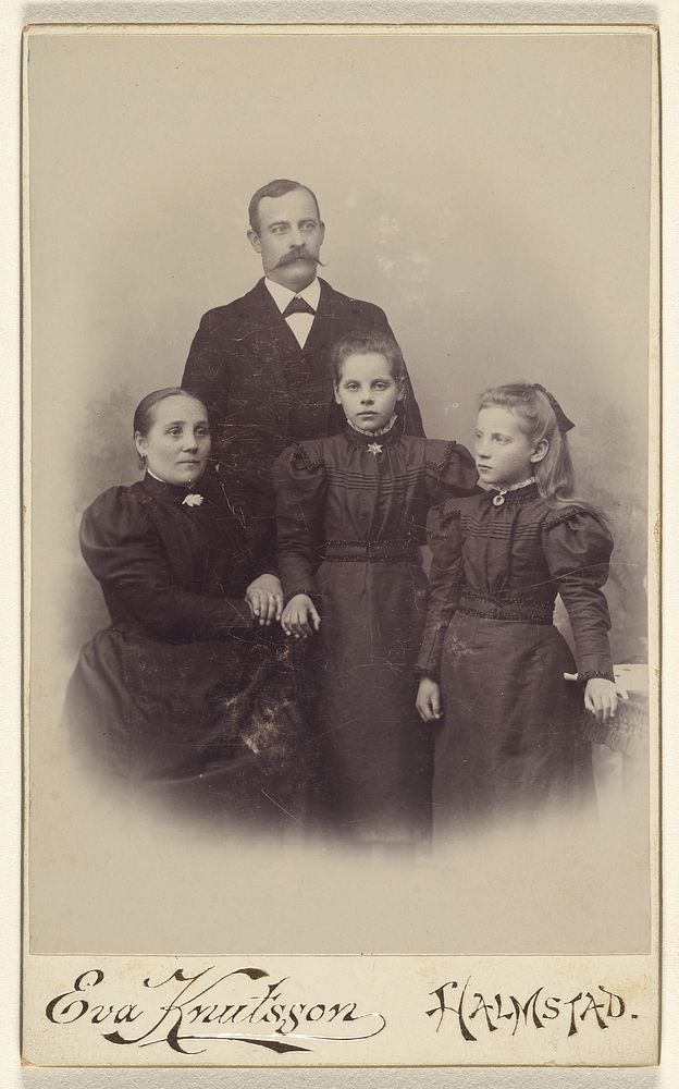 Family portrait: mother, father, and two daughters by Eva Knutsson