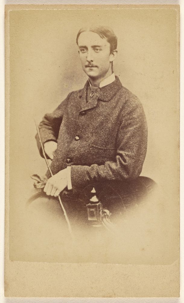 Unidentified well-dressed man with moustache, seated by J Craik
