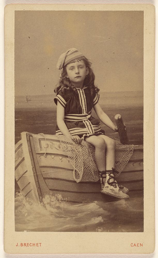 Little girl in a studio setting sitting on a rowboat by Jules Brechet