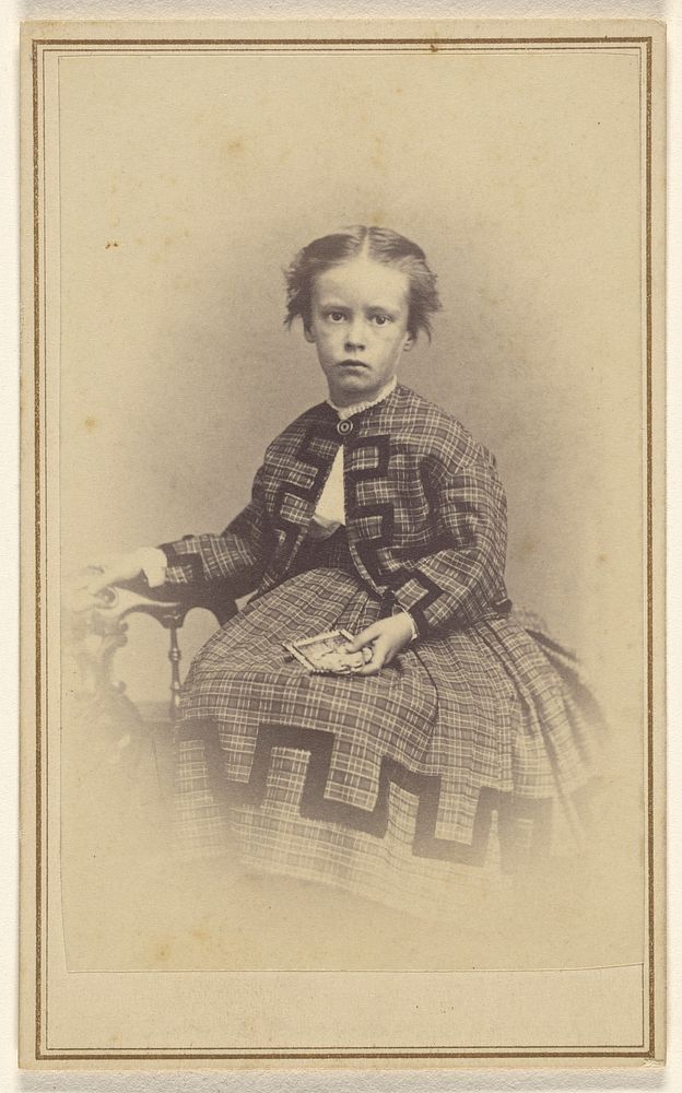 Unidentified little girl, seated by Nichols and Howard