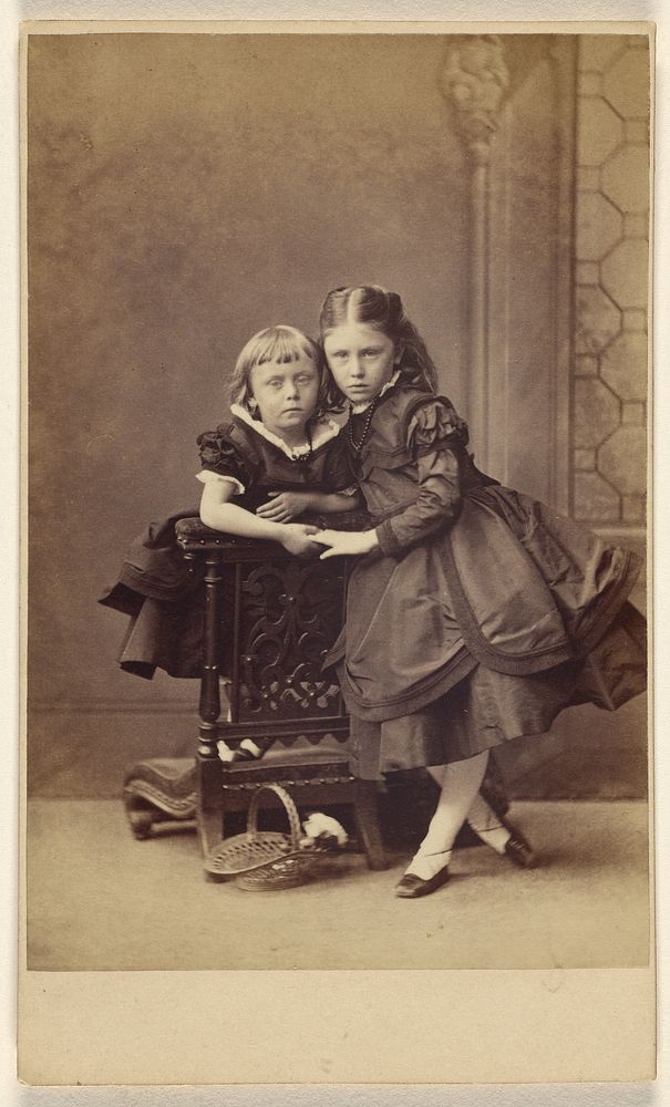 Two unidentified girls, standing by Thomas Rodger