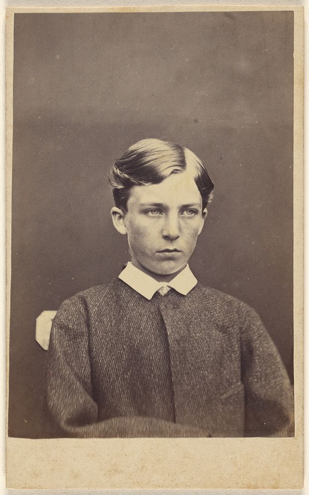 Unidentified boy, seated