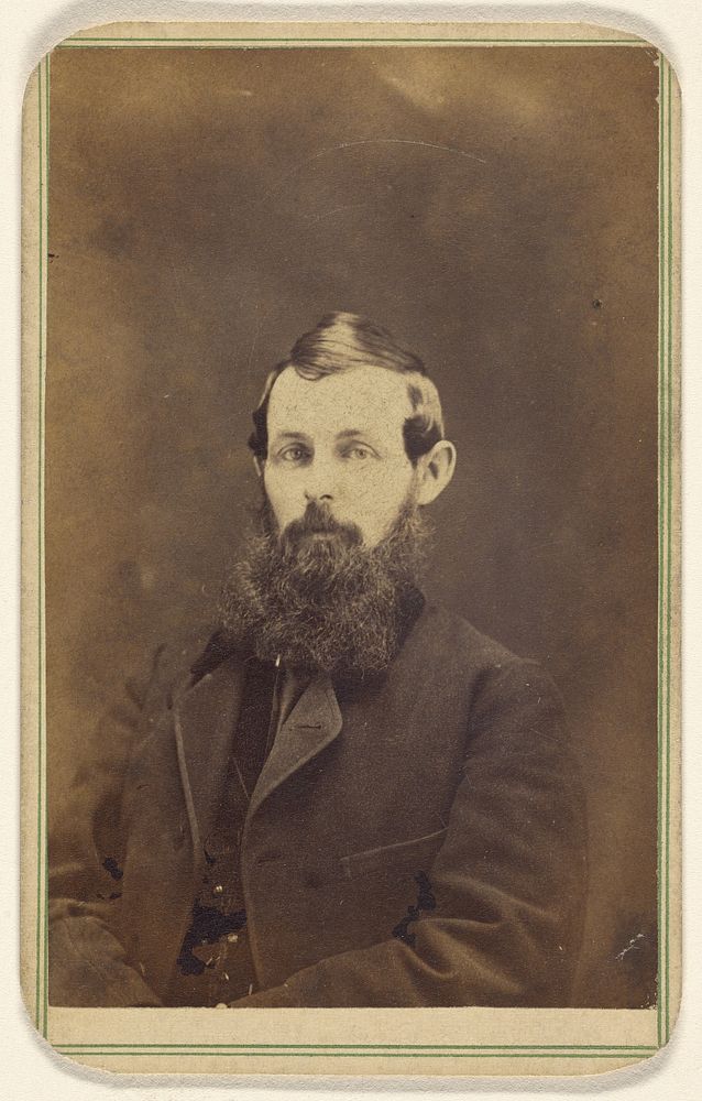 Unidentified man with full beard, seated by George A Lenzi
