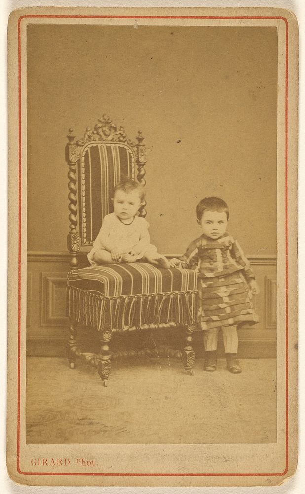 Two unidentified children, one standing, one seated by R Girard