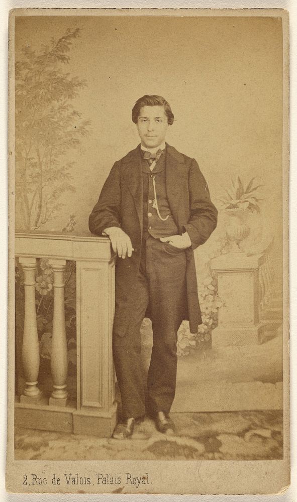 Unidentified man, standing by L Laporte