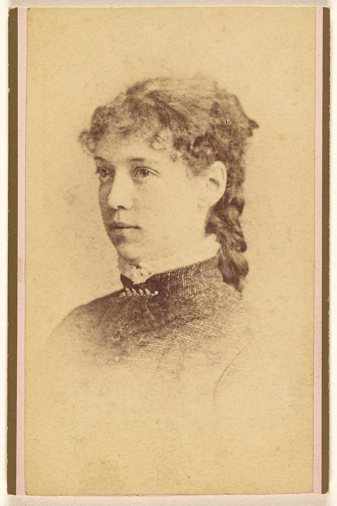 Unidentified young woman in 3/4 profile, printed in vignette-style by Hastings and White and Fisher