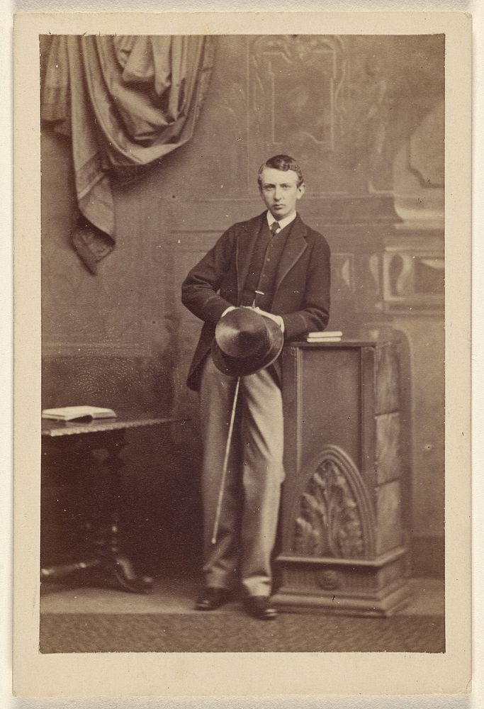 Unidentified man holding a top hat and cane by Camille Silvy