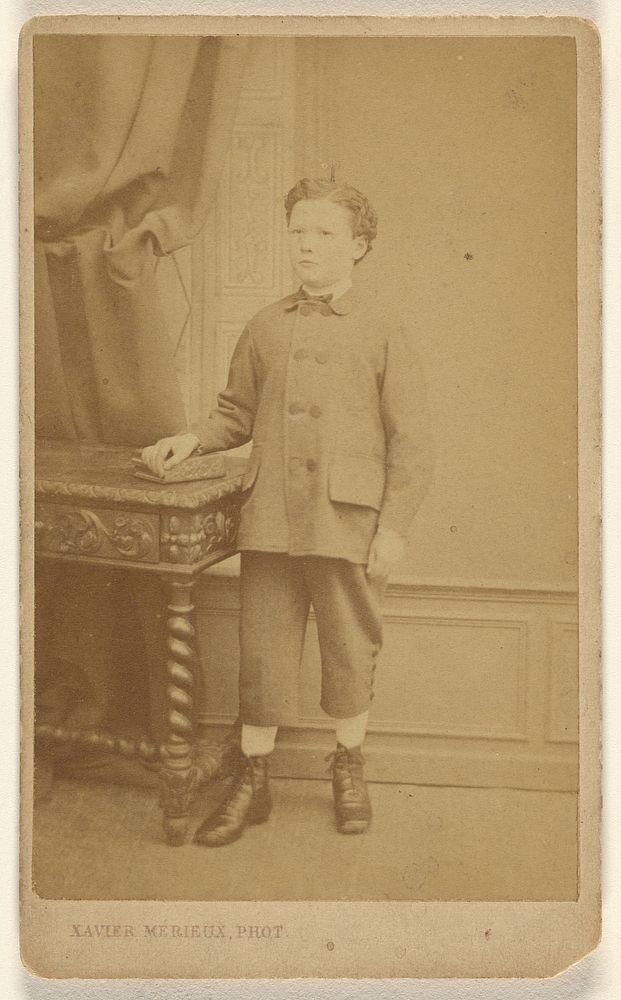 Unidentified boy, standing by Xavier Merieux