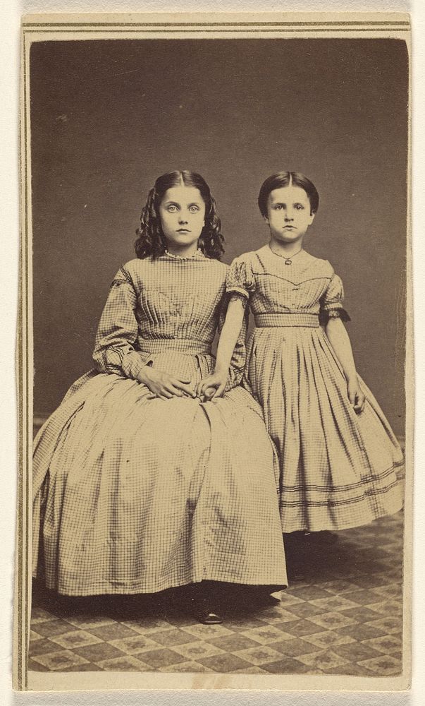 Two unidentified young girls, one seated, one standing by George P Hopkins