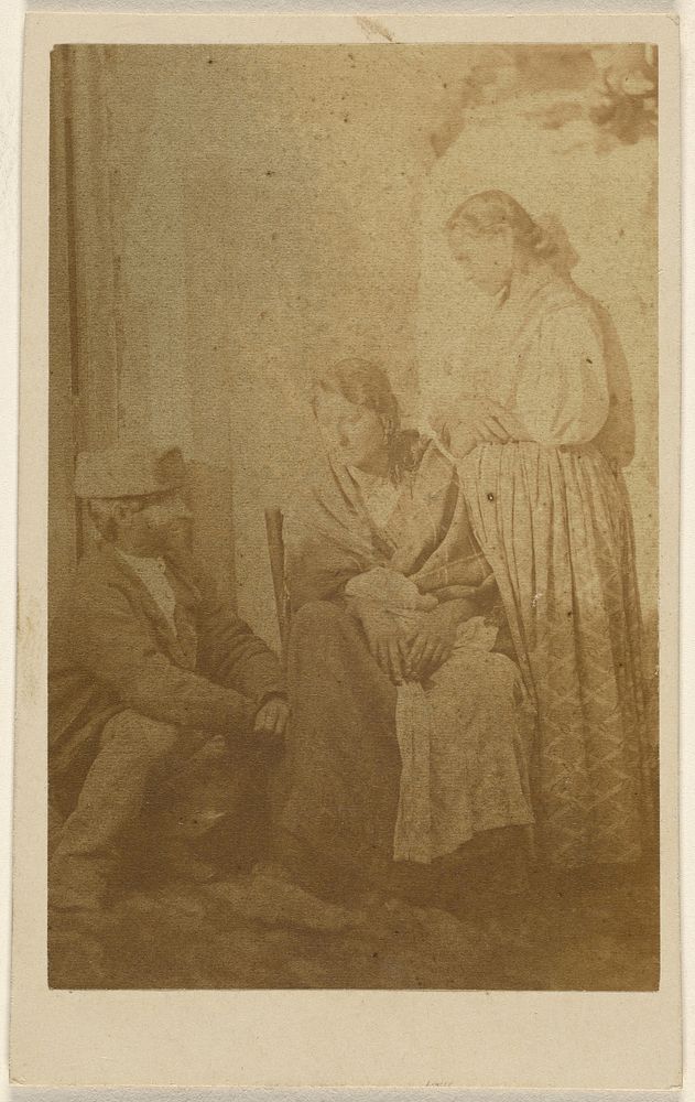 Woman seated holding a baby, a man and woman on either side