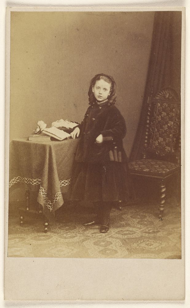 Unidentified little girl, standing by Joseph Brown