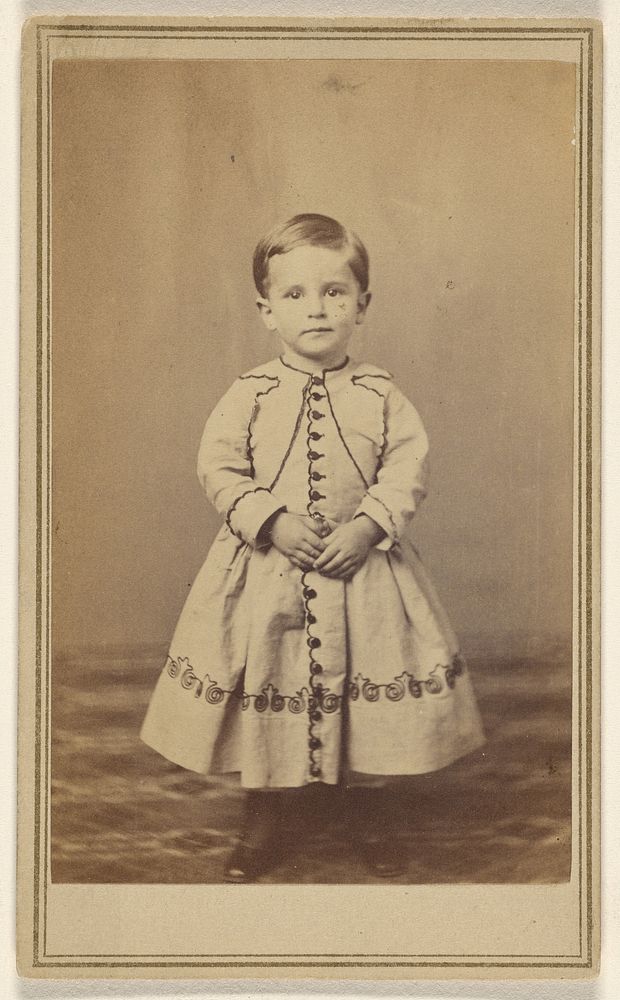 Dinkenspiel Boy [boy with short hair, wearing a dress-like garment, standing] by William J Shew