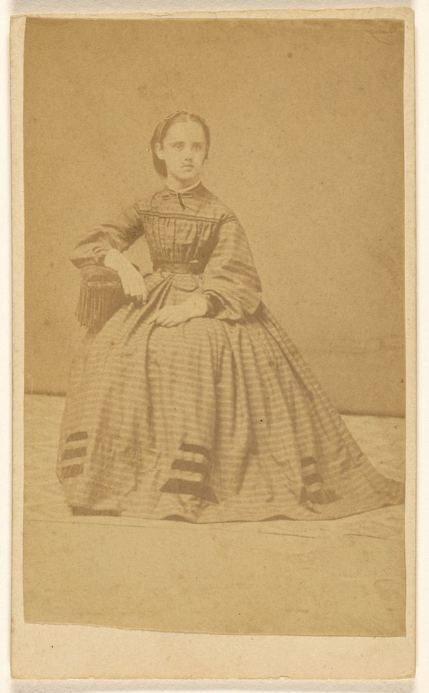 Unidentified young woman, seated by Mrs Elizabeth H Gillett