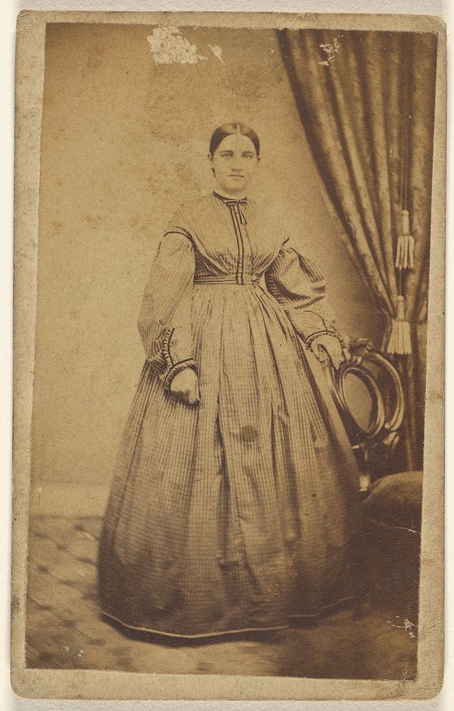 Unidentified woman, standing by Benjamin Lochman
