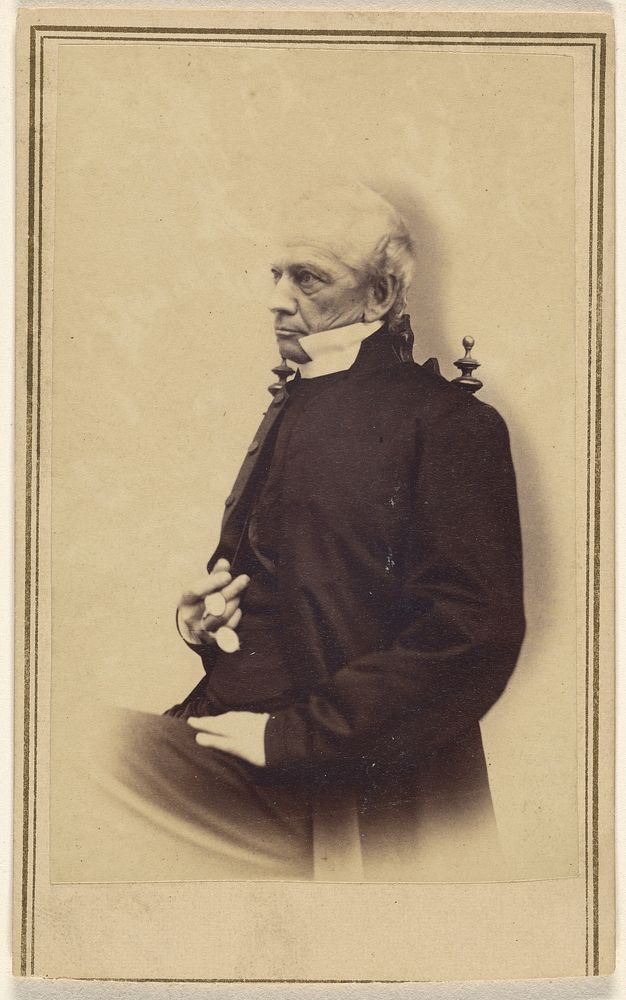 Unidentified balding elderly man seated, holding a pince-nez