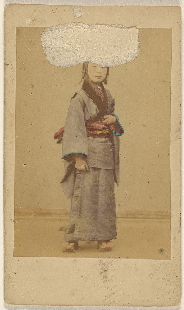 Unidentified Japanese woman in a kimono, standing