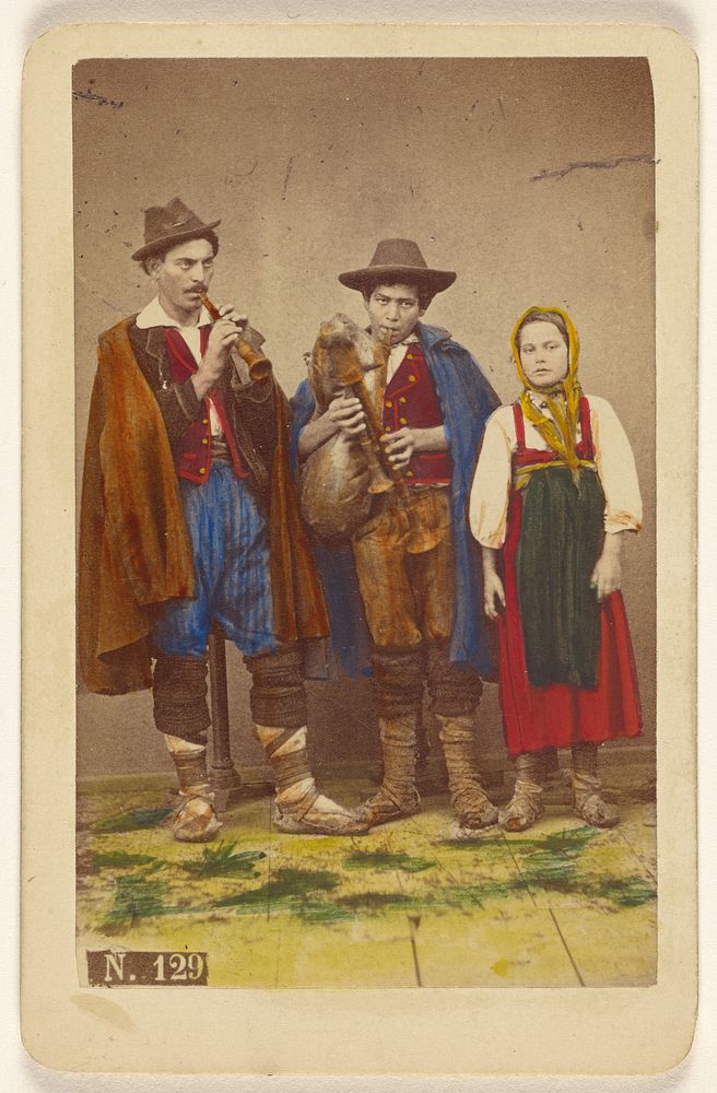 Three Italian peasants standing: two men playing wind instruments, a girl next to them by Giorgio Conrad