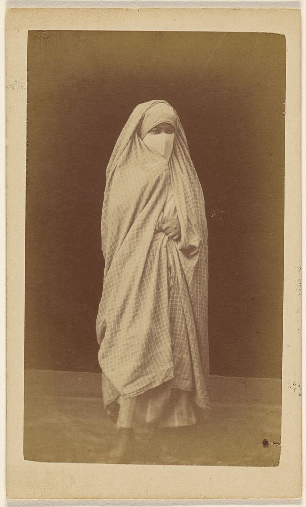 Unidentified Algerian woman wearing a checkered full robe and veil by Claude Joseph Portier