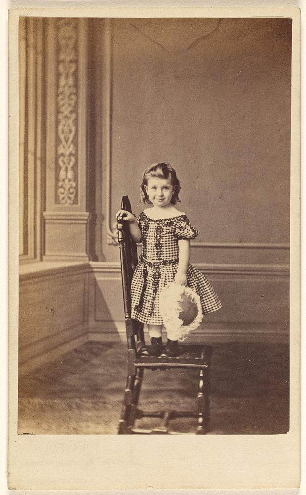 Little girl standing on a chair by Frederick Downer
