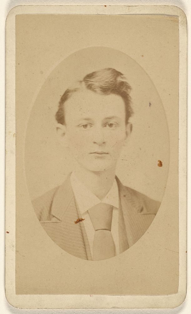 Unidentified young man, printed in quasi-oval style by New York Photograph Room