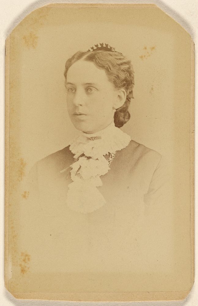 Unidentified woman in 3/4 profile, printed in vignette-style by A and G Taylor