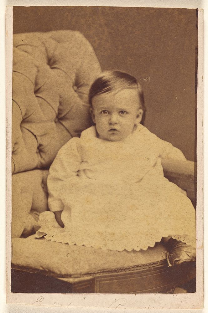 Unidentified baby seated in a chair by W P Egbert