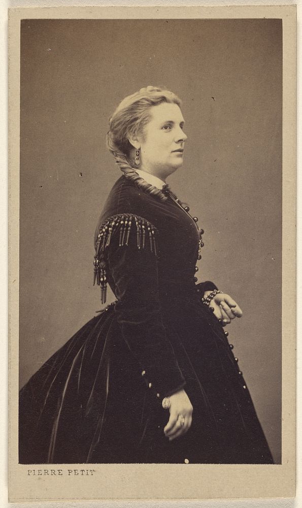 Unidentified woman wearing a dark dress, standing, in profile by Pierre Petit