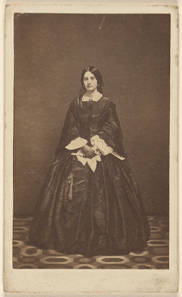 Unidentified woman, standing