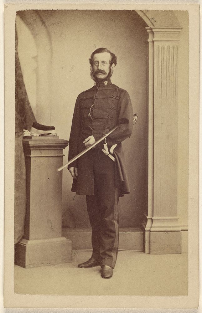 Unidentified bearded British soldier with sword under his left arm, standing by Thomas Rodger