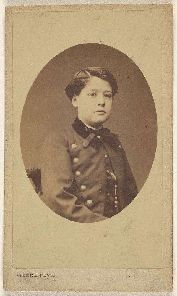 Unidentified young boy seated, printed in quasi-oval style by Pierre Petit