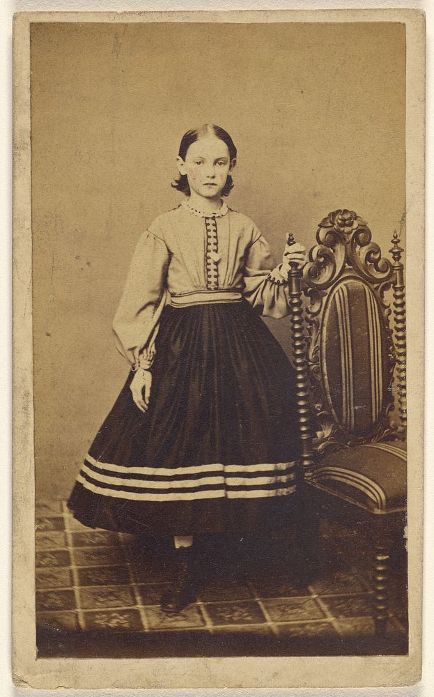 Unidentified young girl, standing by John W Hurn
