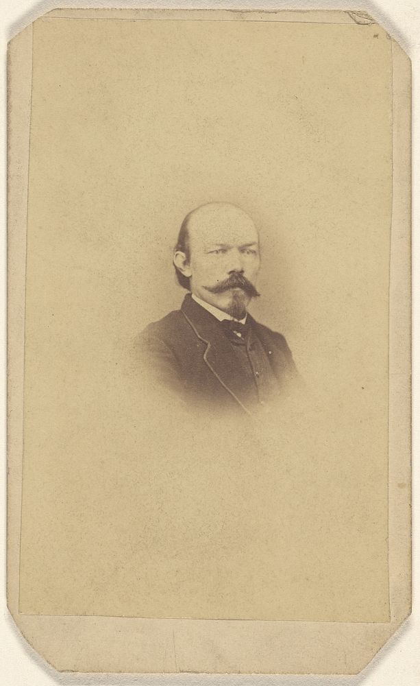 Unidentified man with handlebar moustache and goatee, printed in vignette-style