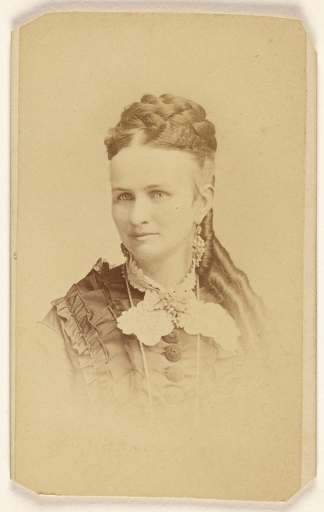 Unidentified woman with long curls, printed in vignette-style by Abraham Bogardus