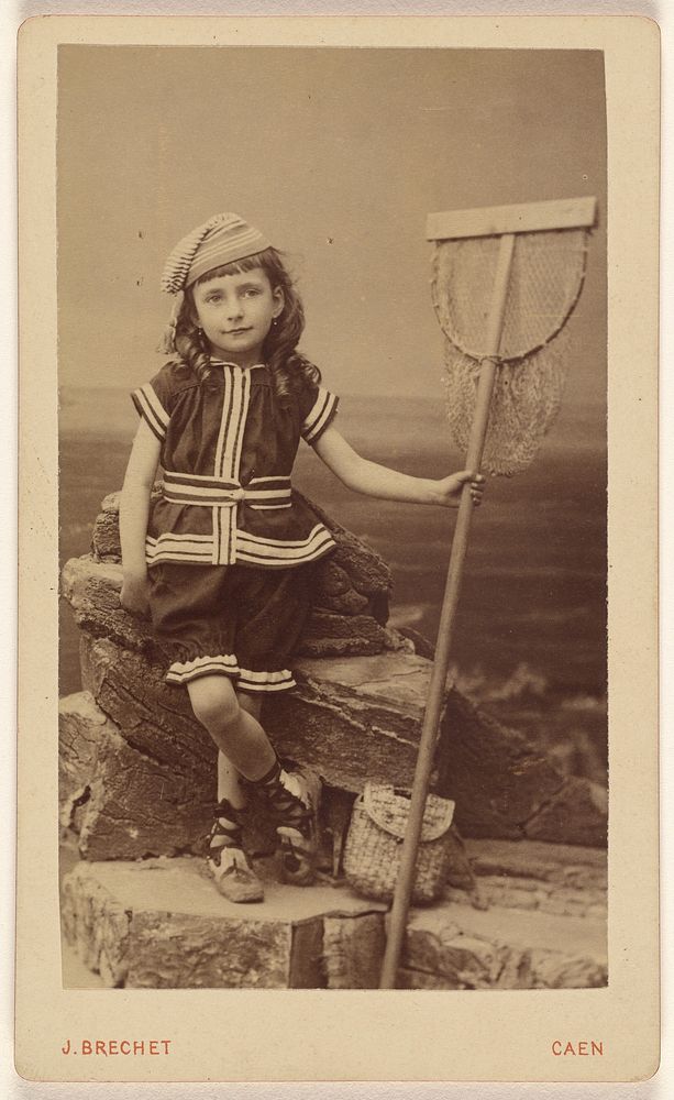 Unidentified little girl seated on rock, holding a fishing net basket by Jules Brechet
