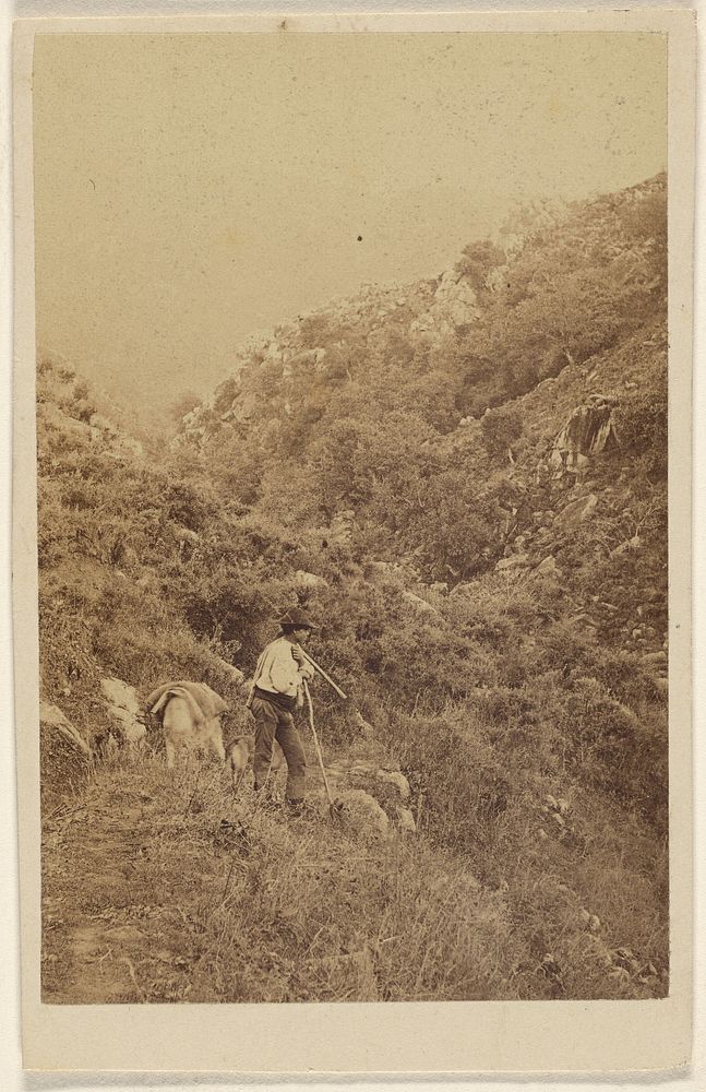 Unidentified man walking up a hill