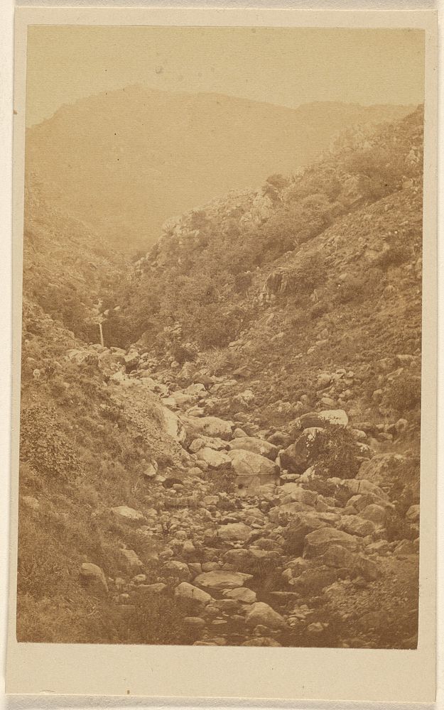 View of an unidentified rocky mountains and valley