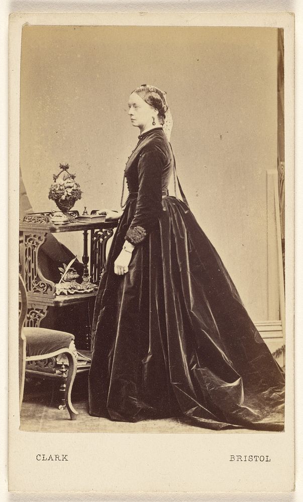 Unidentified woman wearing a long dress, in profile, standing by William Clark