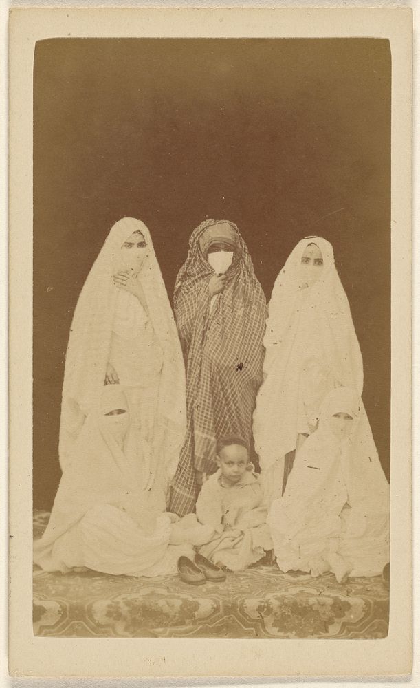 Three Algerian women wearing veils standing, with a little unveiled girl, seated at their feet by Claude Joseph Portier