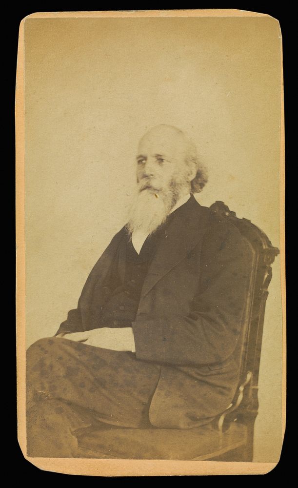 Unidentified balding man with a long white beard, seated by William H Mumler