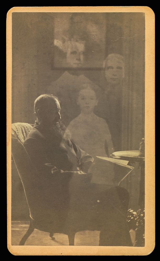 Unidentified man with a long beard seated with three "spirits" by William H Mumler